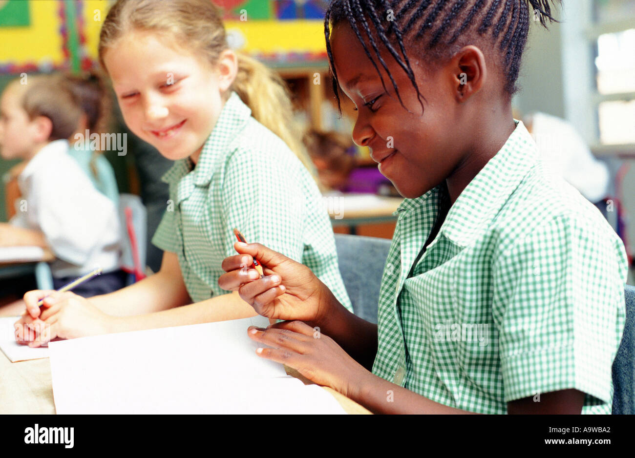 School girls in uniform smiling Johannesburg Gauteng South Africa Stock