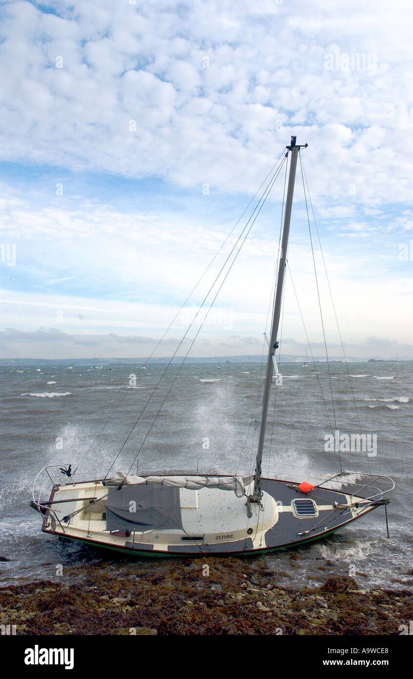 sailboat washed ashore