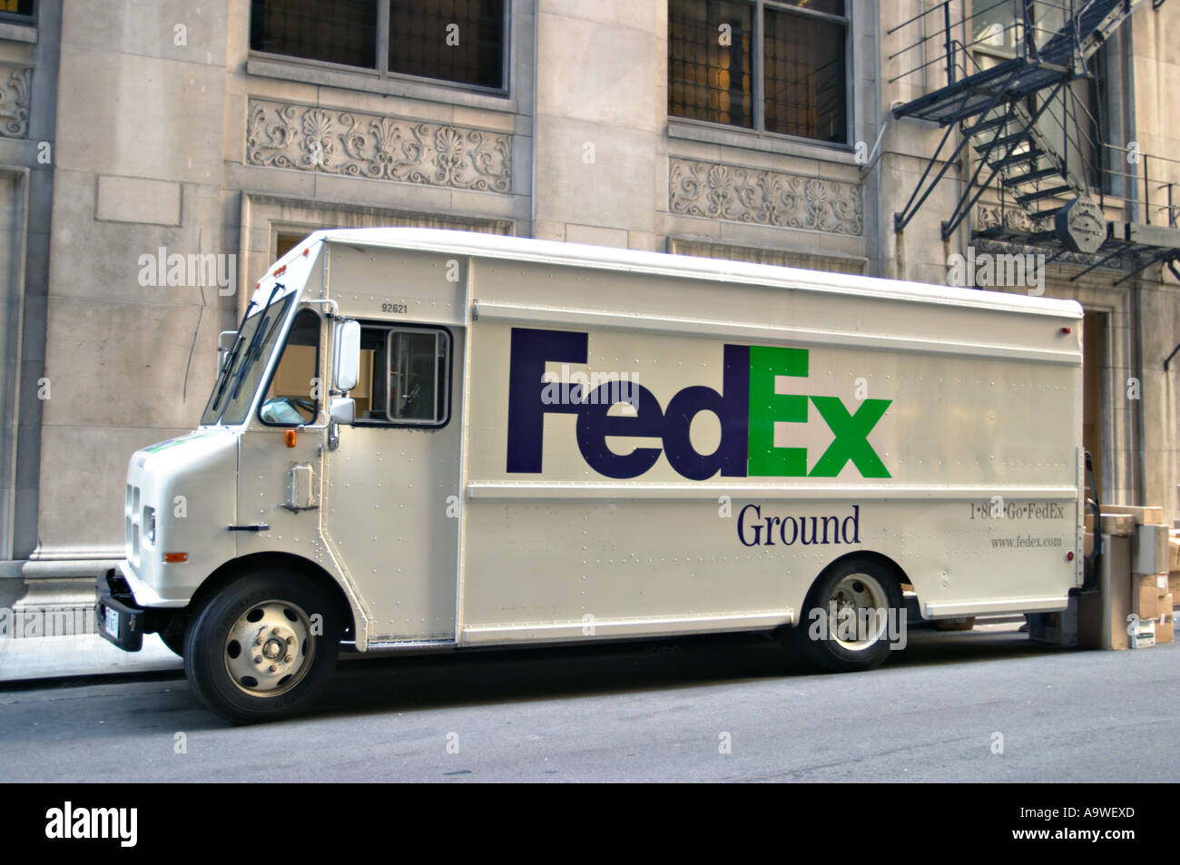 WORKERS Chicago Illinois FedEx Ground delivery truck parked in downtown