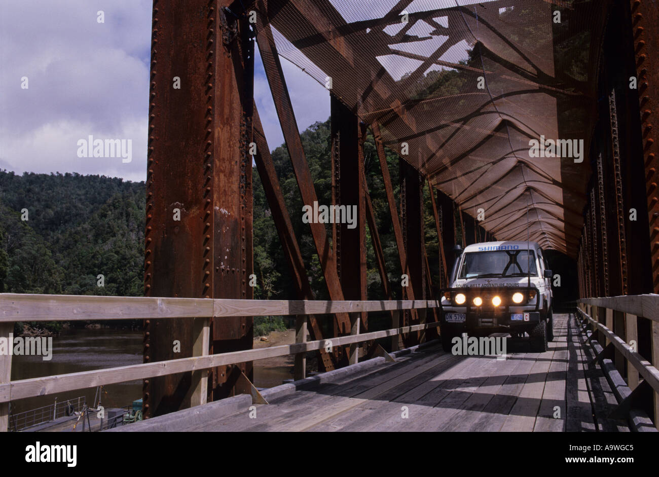 Four wheel drive vehicle crossing single track bridge in Tasmania Stock Photo Alamy