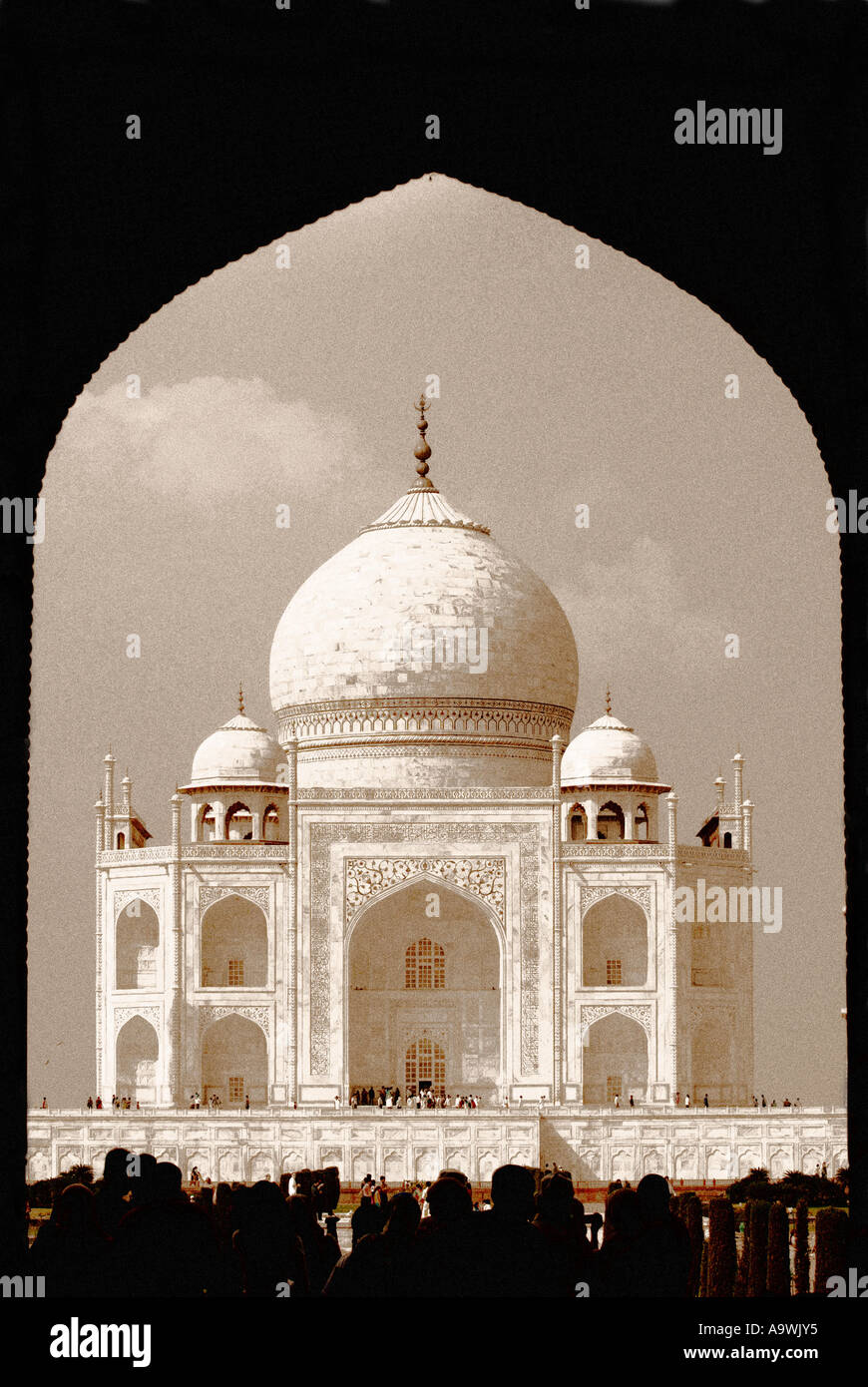 Taj Mahal through archway Agra Uttar Pradesh India Black white lith and grainy Stock Photo