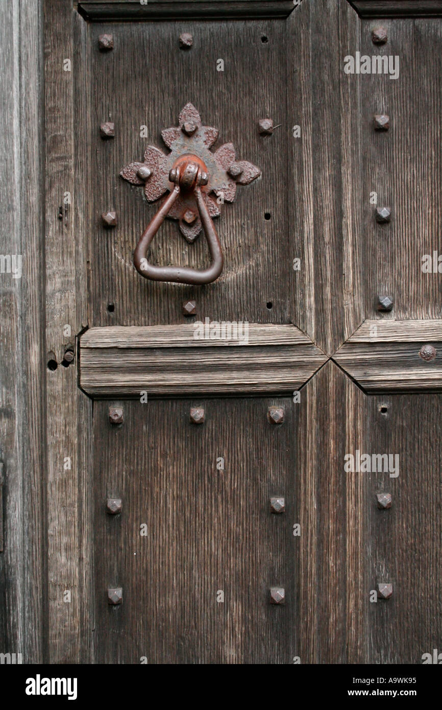 Old wooden door detail iron door handle Stock Photo