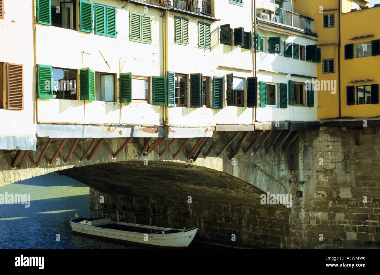 Italy, Florence, building complex on bridge over river Arno Stock Photo