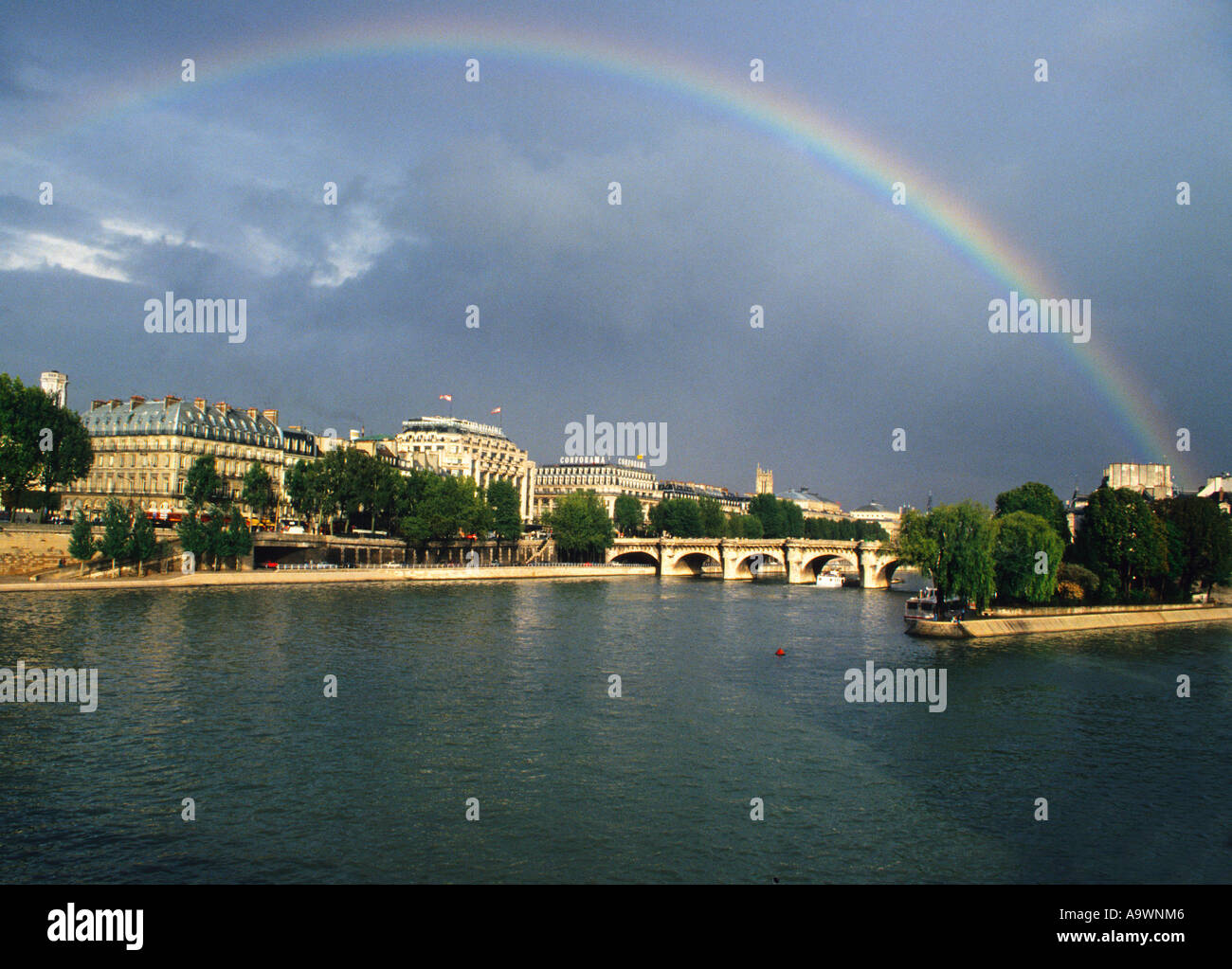 Paris The River Seine Ile De La Cite Rainbow Dark Storm Clouds France Europe Stock Photo Alamy