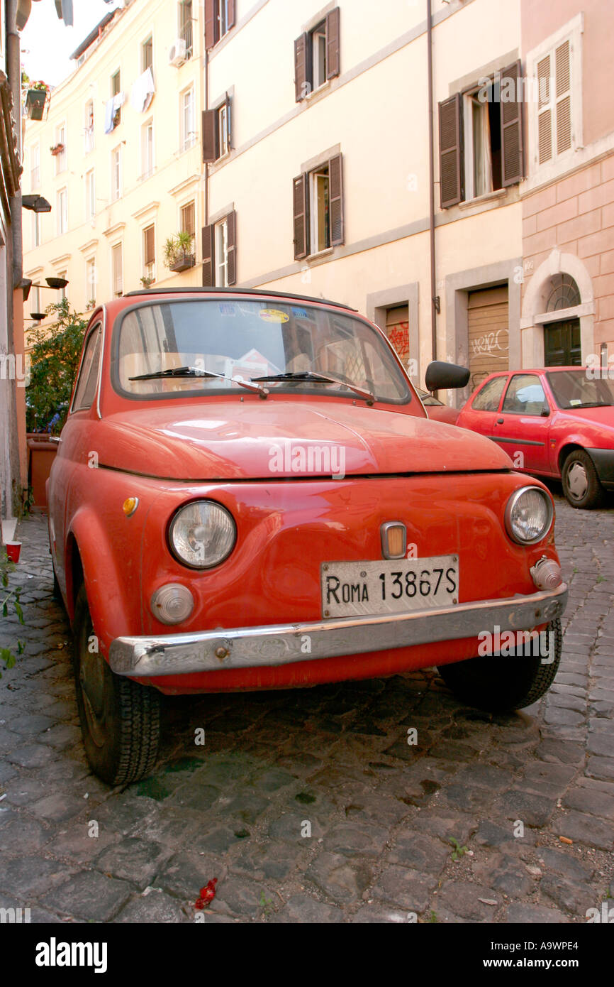 Red Fiat 500 parked in a street in Rome Italy Stock Photo - Alamy