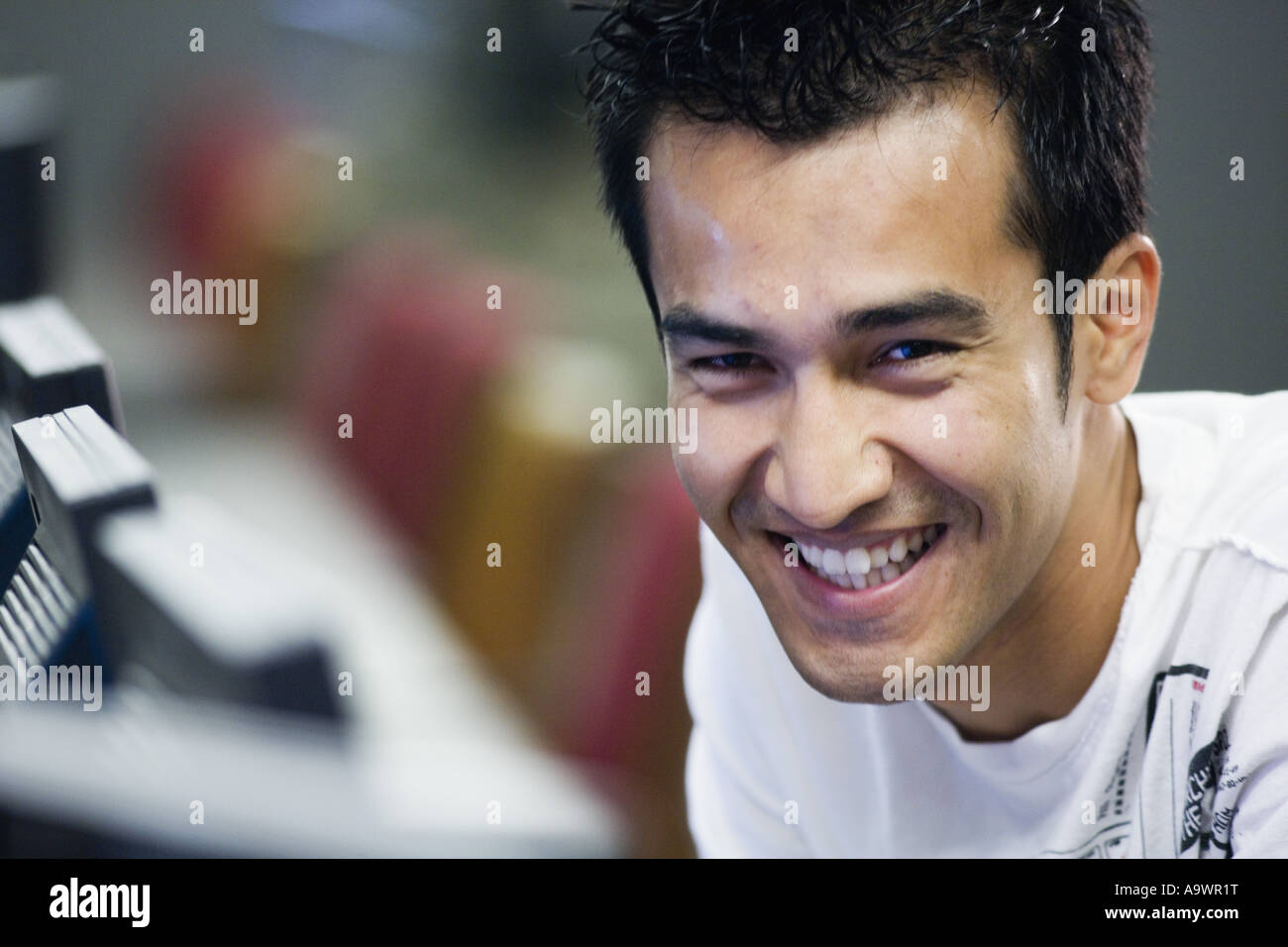 Portrait of a smiling young man Stock Photo - Alamy