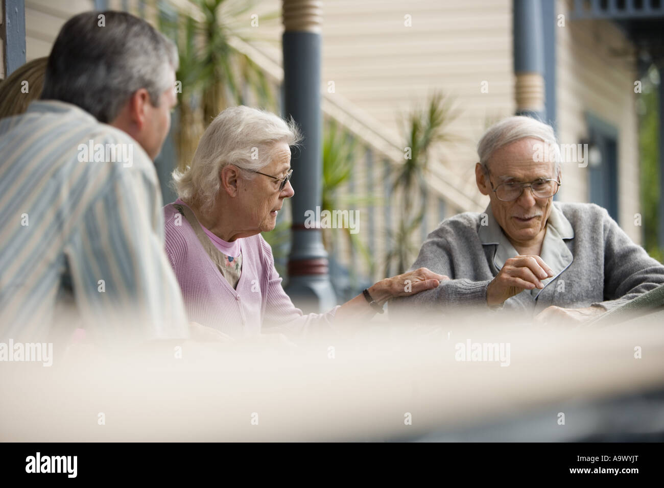 adult-children-visiting-with-elderly-parents-stock-photo-alamy