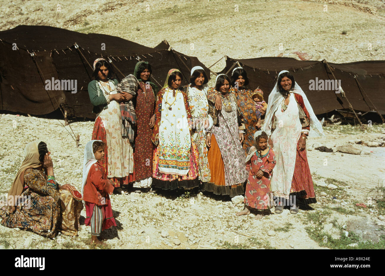 Nomadic Qashkai tribal women children and tents Near Farasband South of Shiraz Iran Stock Photo