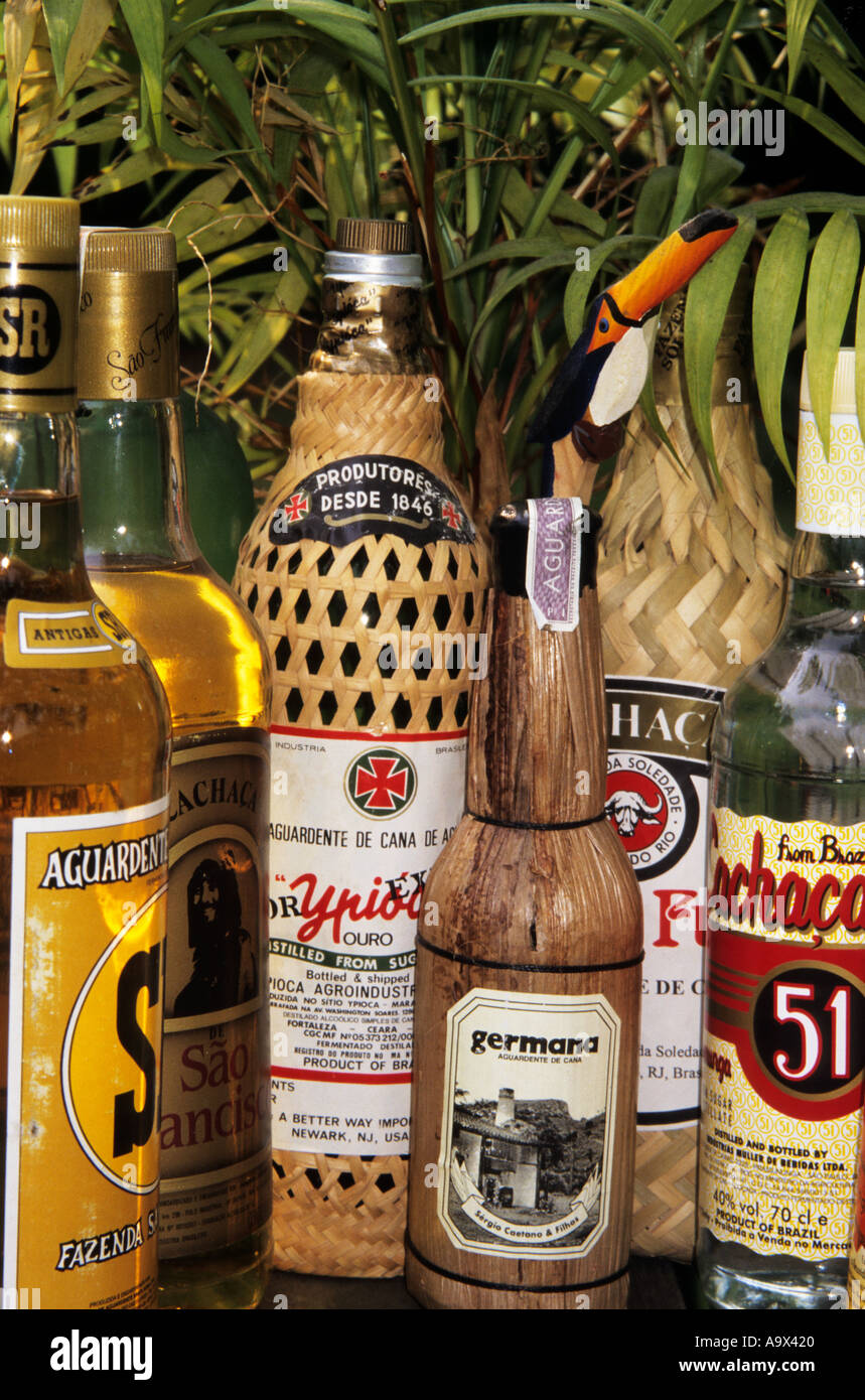 Brazil. Bottles of Cachaca (pure sugar cane alcohol), showing their
