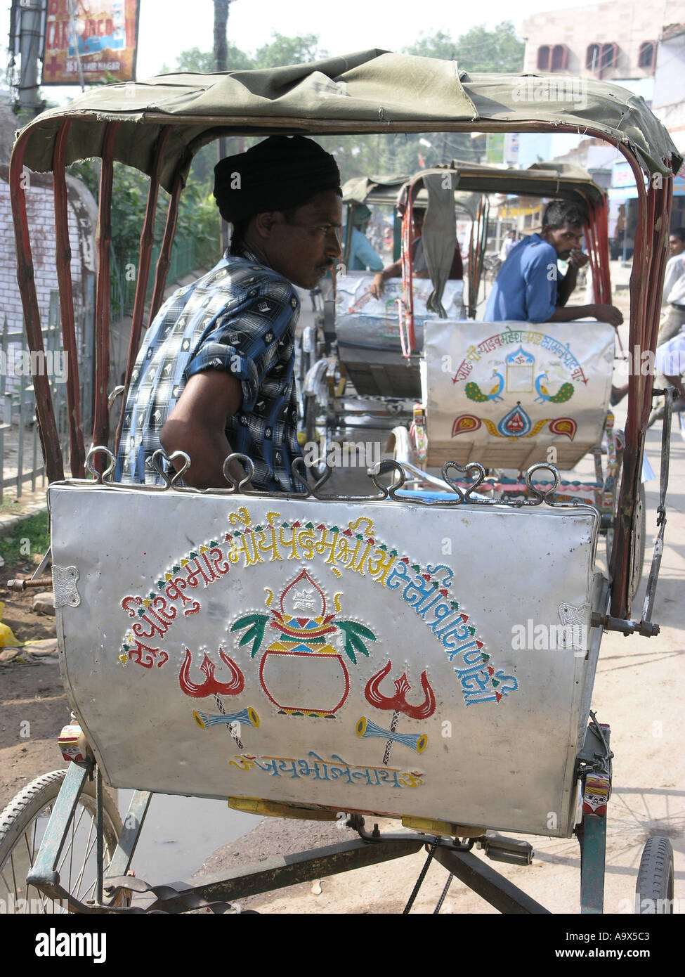 Pedal Rickshaw driver Stock Photo Alamy