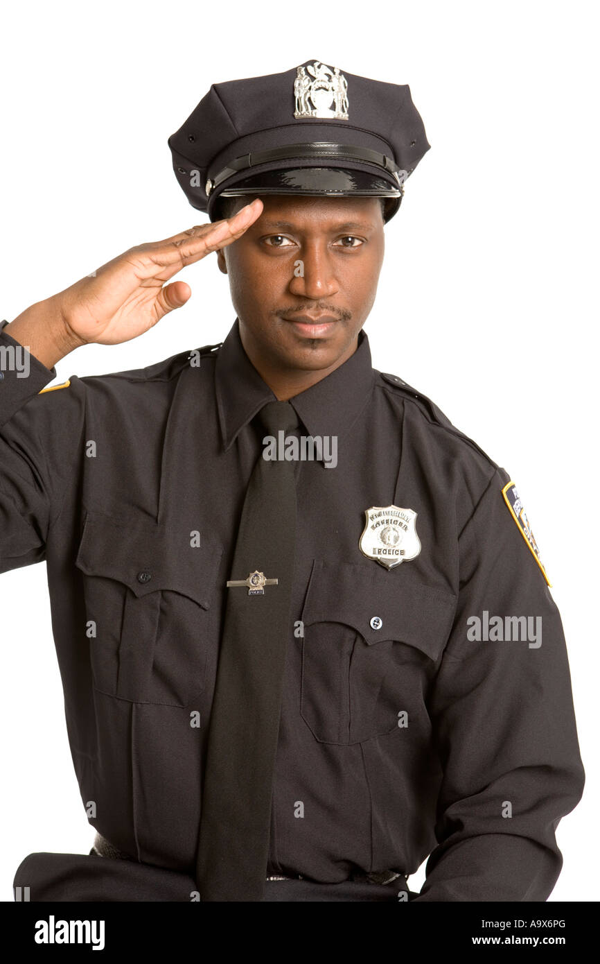 Young black American police officer saluting the camera Stock Photo
