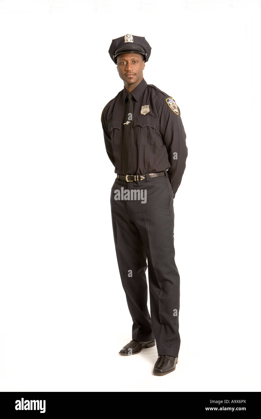Young black American police officer in uniform standing looking at the camera Stock Photo