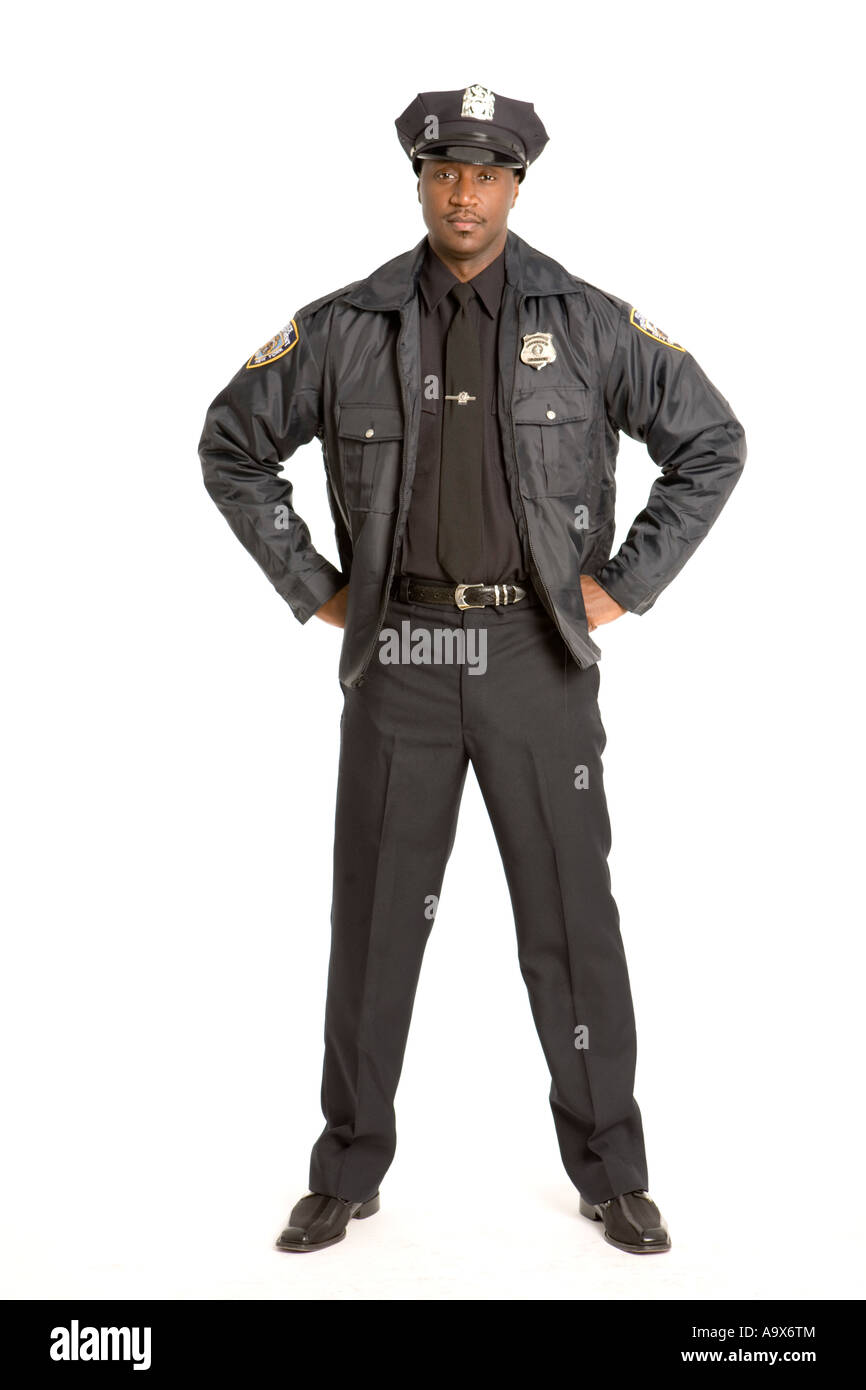 African American police officer standing with his hands on his hips wearing uniform Stock Photo
