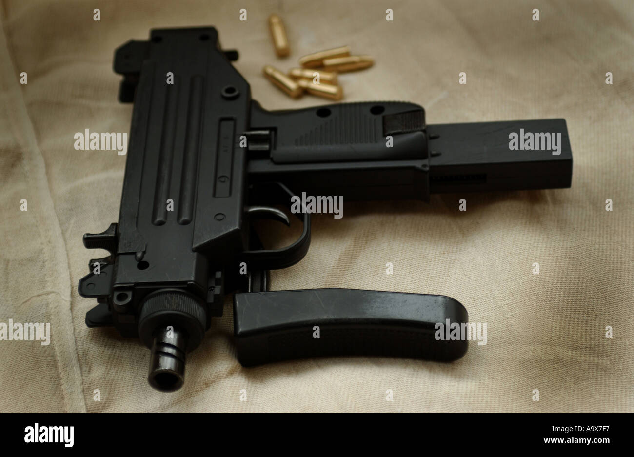 an uzi sub machinegun with some 9mm bullets Stock Photo