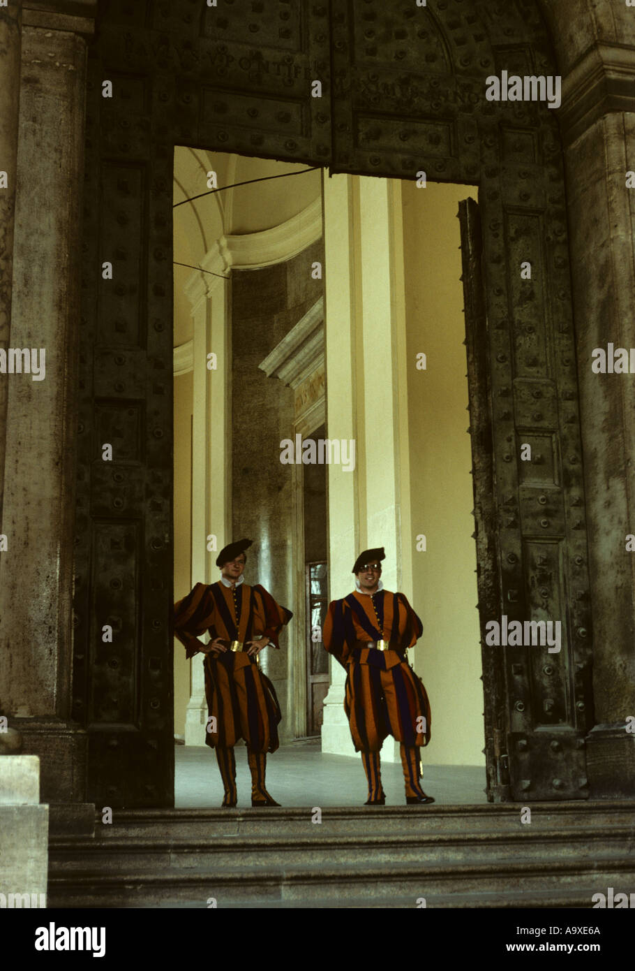 Swiss Guards On Duty At The Bronze Door To The Vatican