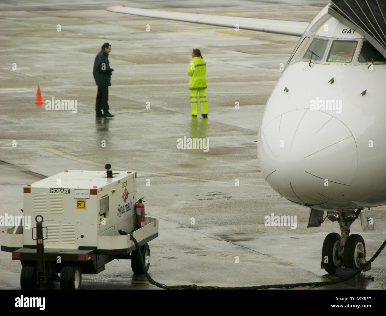 An Aircraft and Airport Ground Staff Stock Photo Alamy