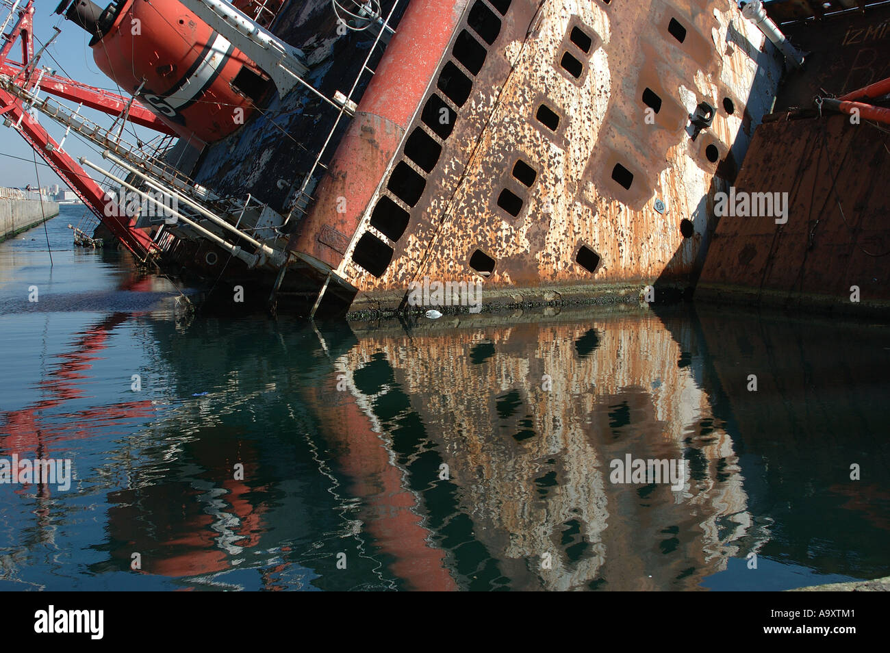 A half sunken ship with it's reflection. Sultanahmet area, Istanbul, Turkey Stock Photo