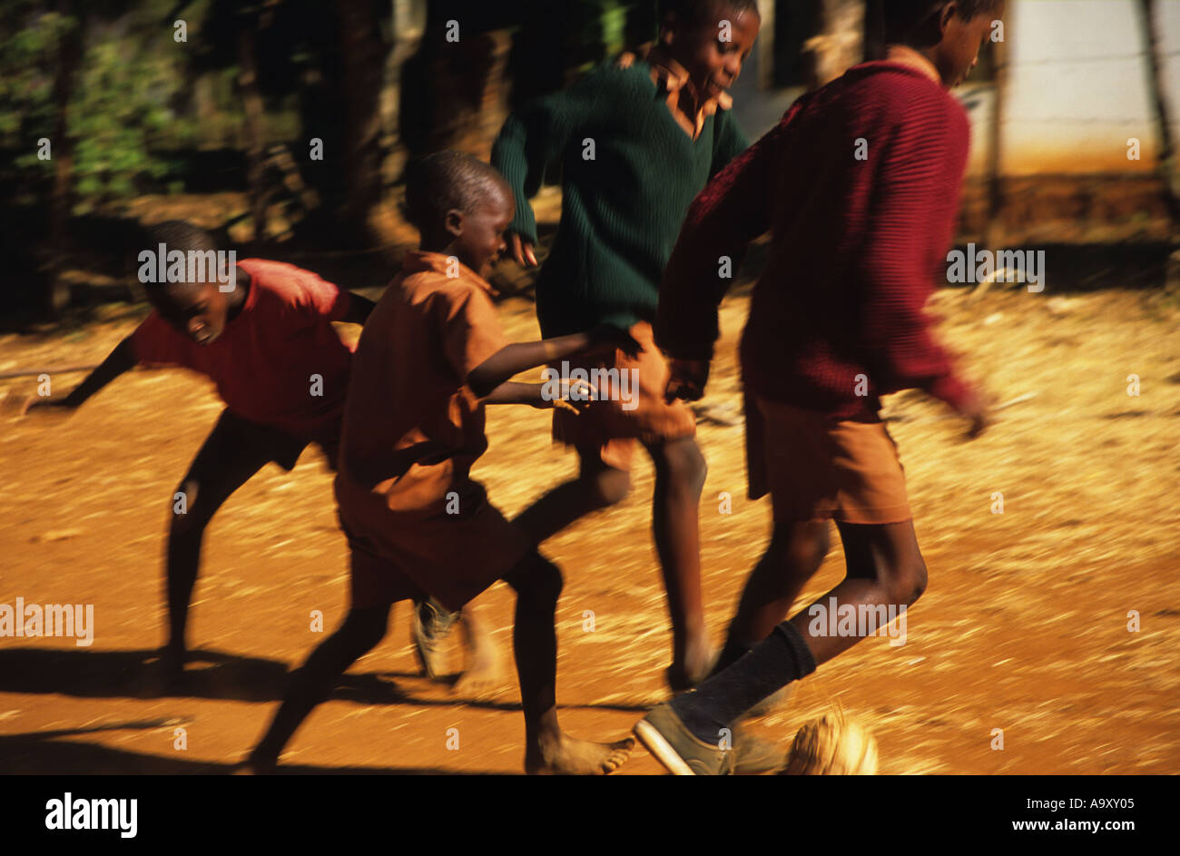 Orphans playing football at Shearley Cripps Children's home Harare Zimbabwe Africa Stock Photo