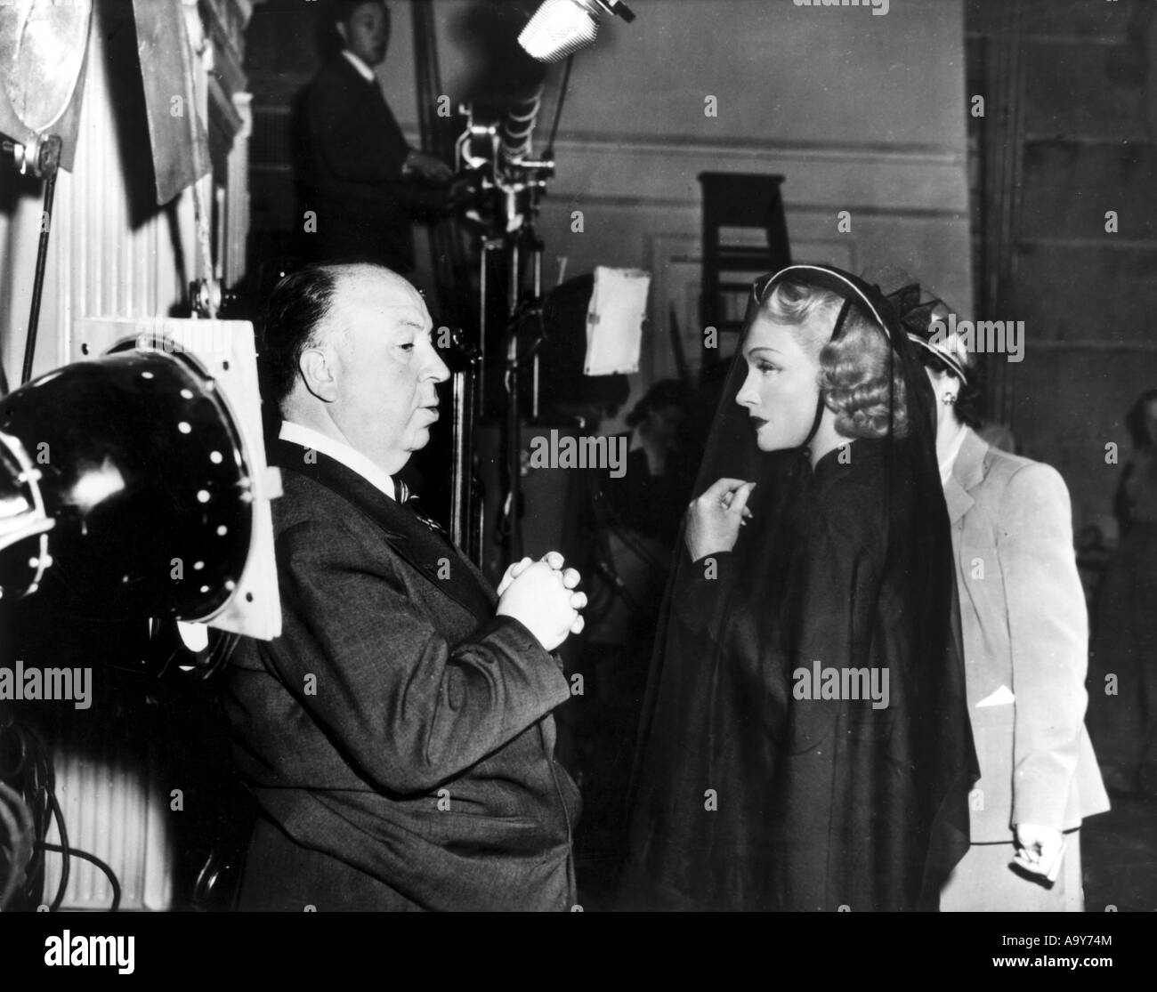 ALFRED HITCHCOCK with Marlene Dietrich  during filming of  Stage Fright in 1950 Stock Photo