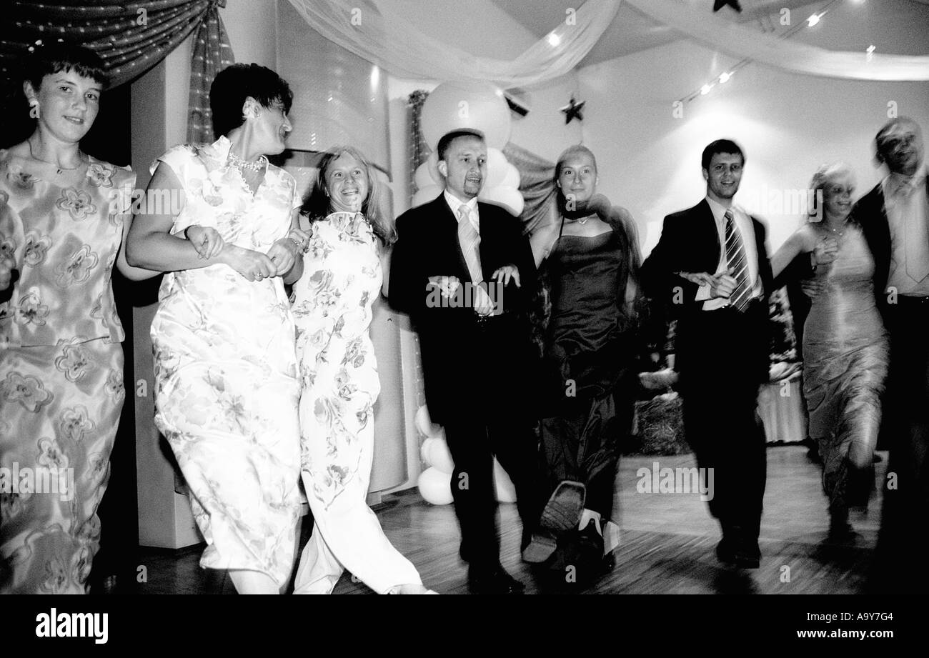Poland, Lodz, wedding guests dancing at party (B&W) Stock Photo
