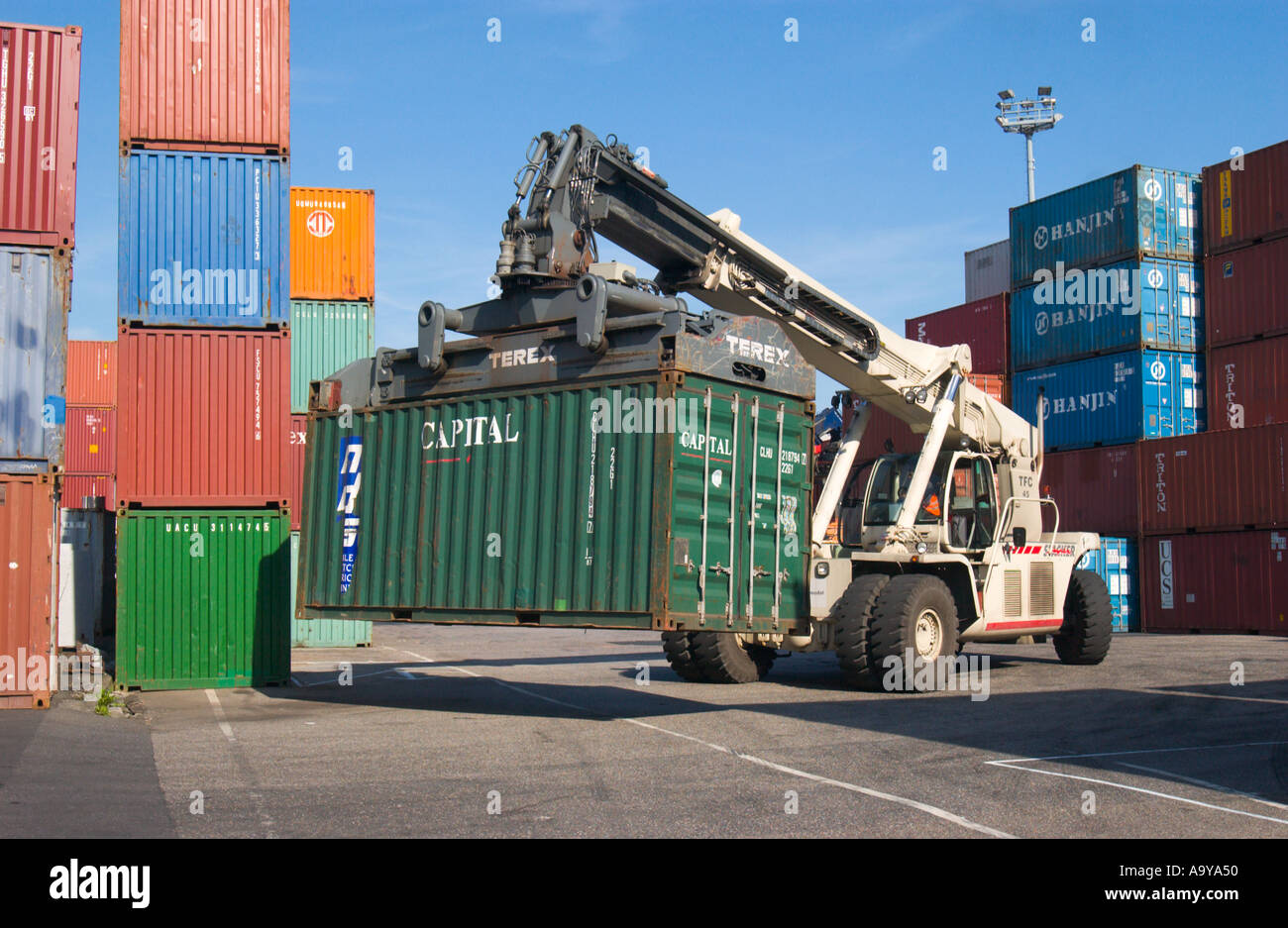 lifter loader moving freight container in container terminal Stock ...