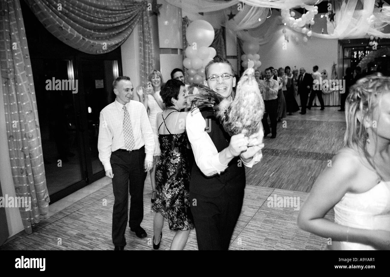 Poland, Lodz, wedding guests in party, portrait (B&W) Stock Photo