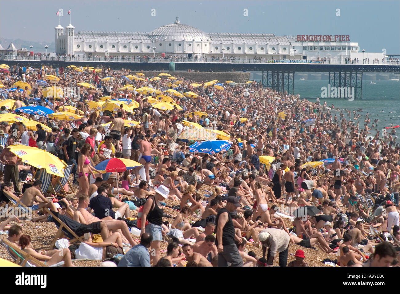 Crowded beach by the East Pier. Brighton, England Stock Photo 2325807