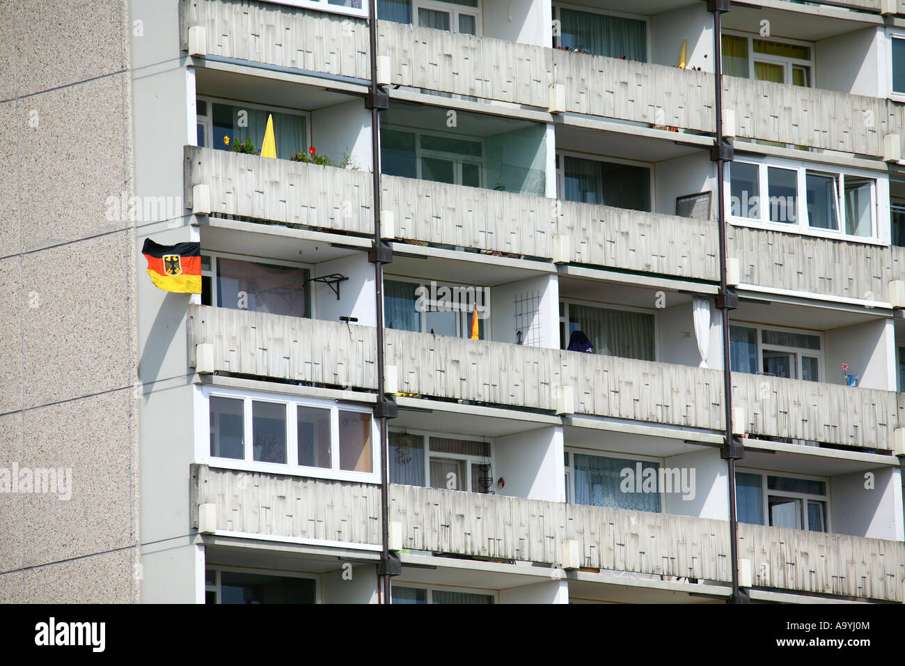 Apartment building with German flag Stock Photo