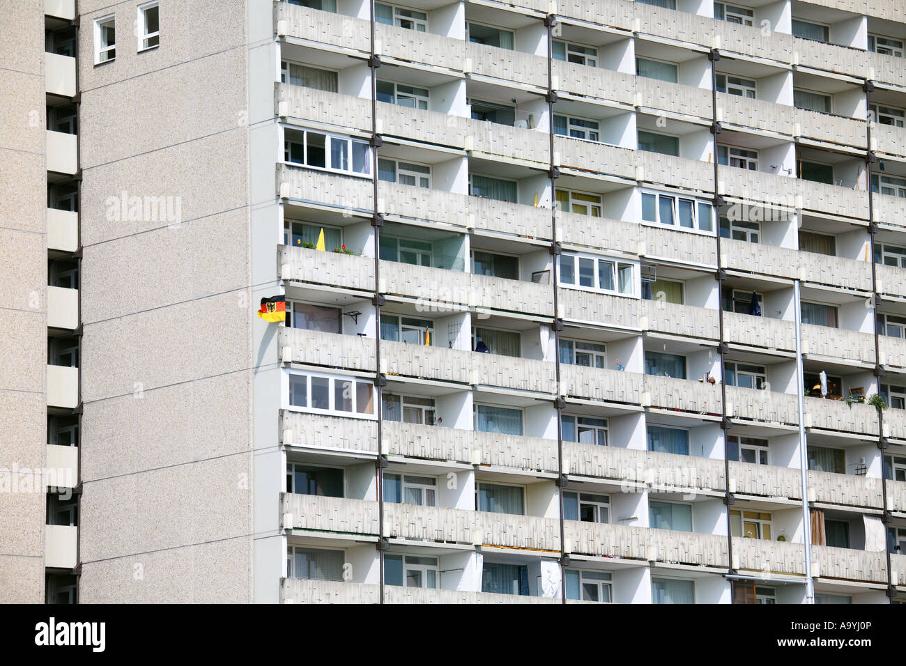 Apartment building with German flag Stock Photo