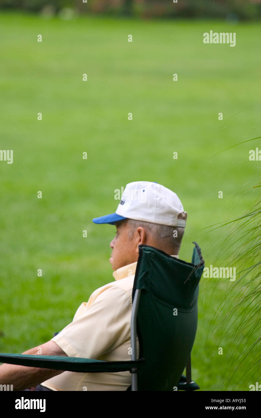 Older man wearing baseball cap hi-res stock photography and images - Alamy