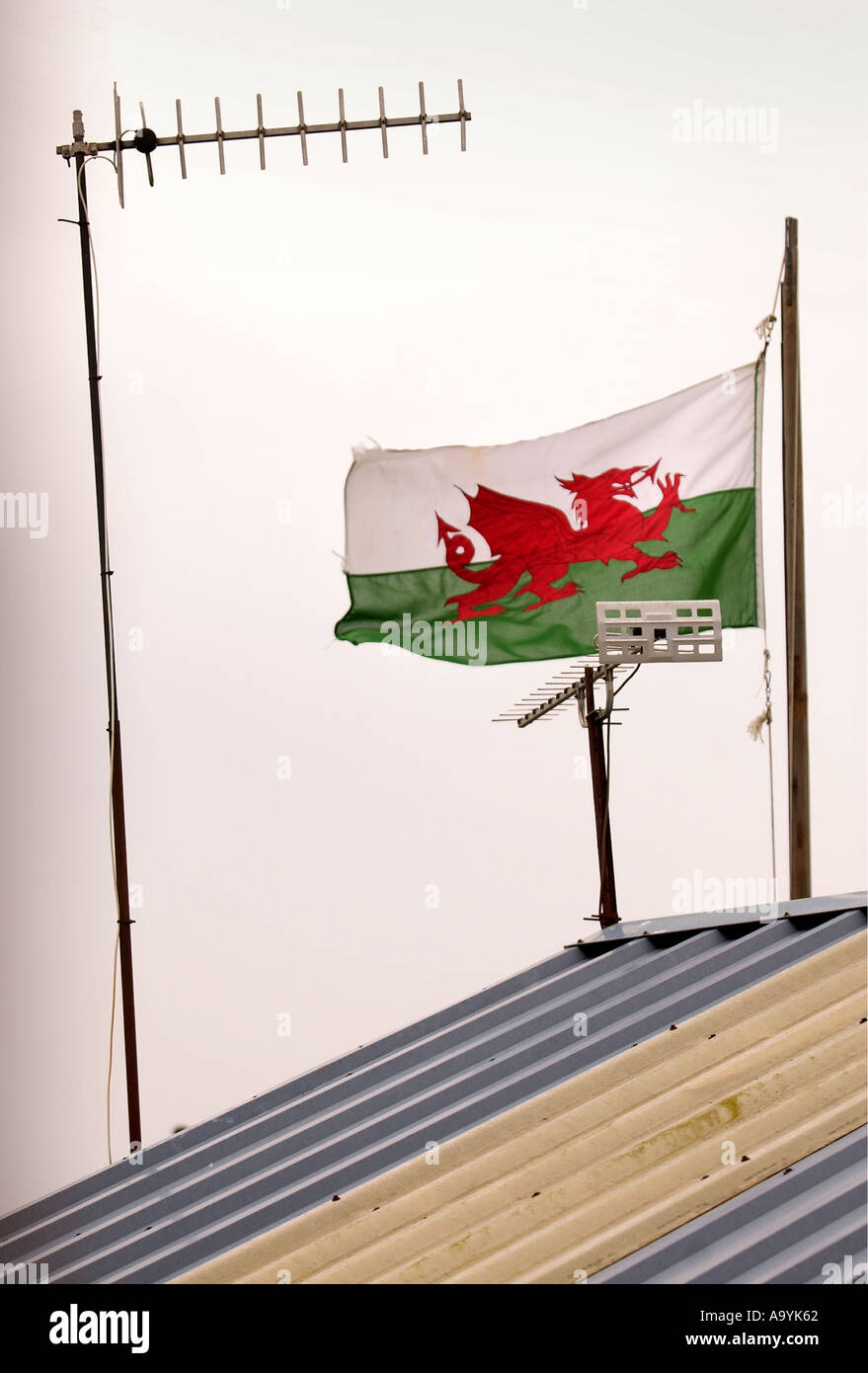 A WELSH FLAG FLIES ABOVE A GARAGE IN WALES 2005 Stock Photo