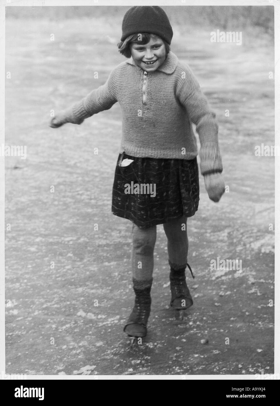 Skating Girl In Jumper Stock Photo Alamy