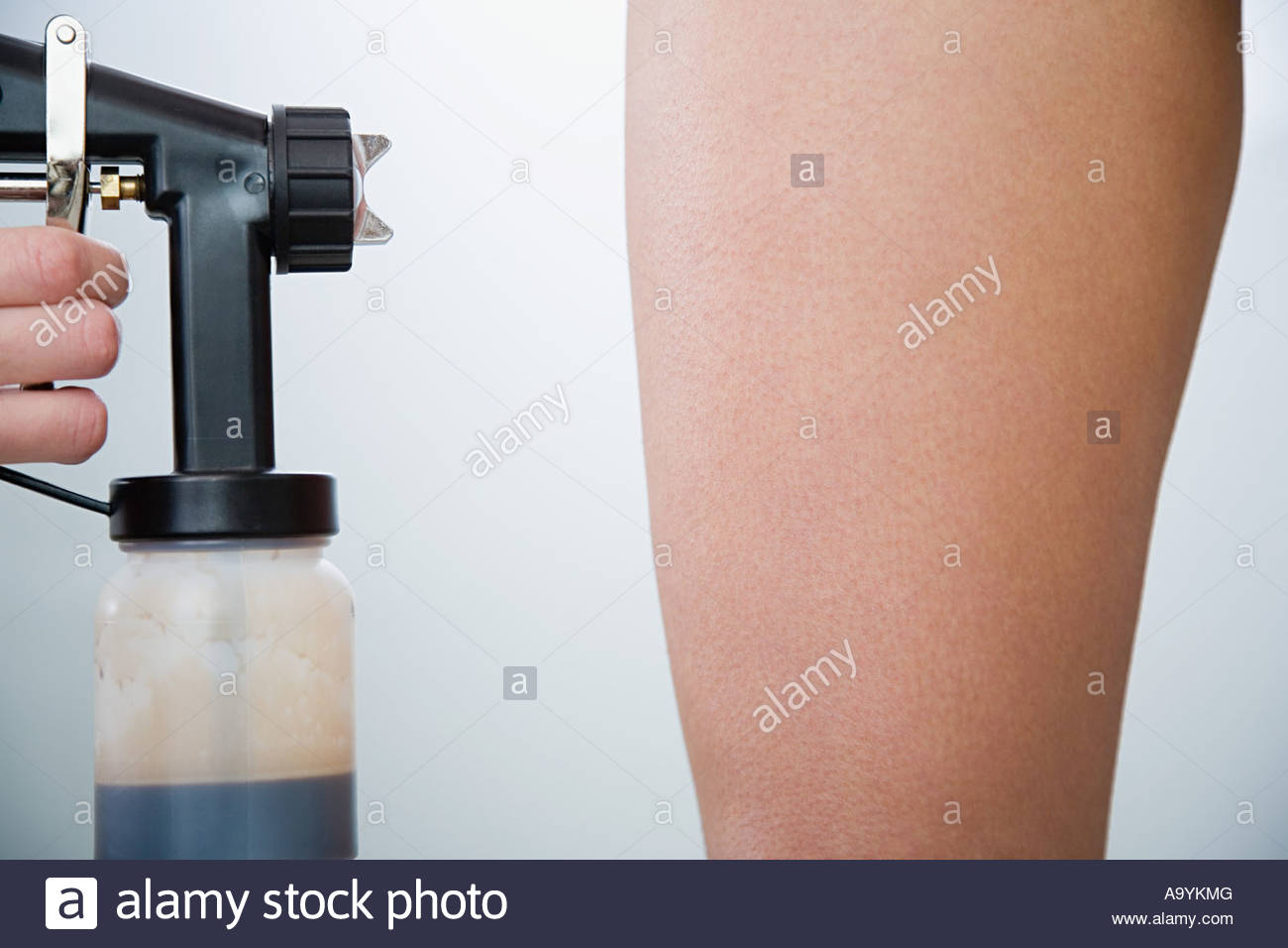 Spray Tan Stock Photos & Spray Tan Stock Images Alamy