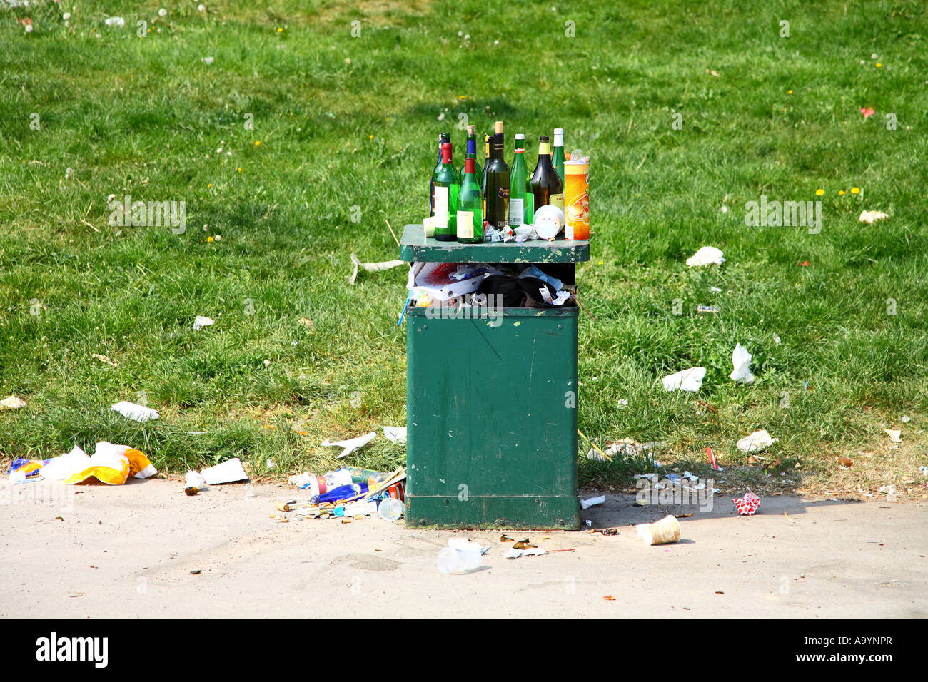 Garbage can full with empty bottles Stock Photo