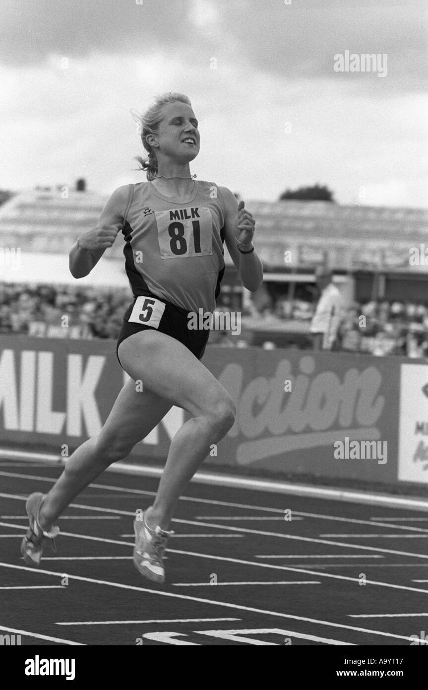 Katharine Merry winning 100m race at 1991 English Schools Athletics Championships, Stoke-on-Trent, UK Stock Photo