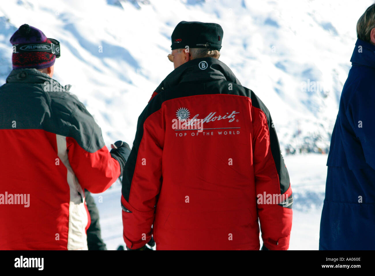 Ski instructor with client at the ski resort of St Moritz Switzerland Stock Photo
