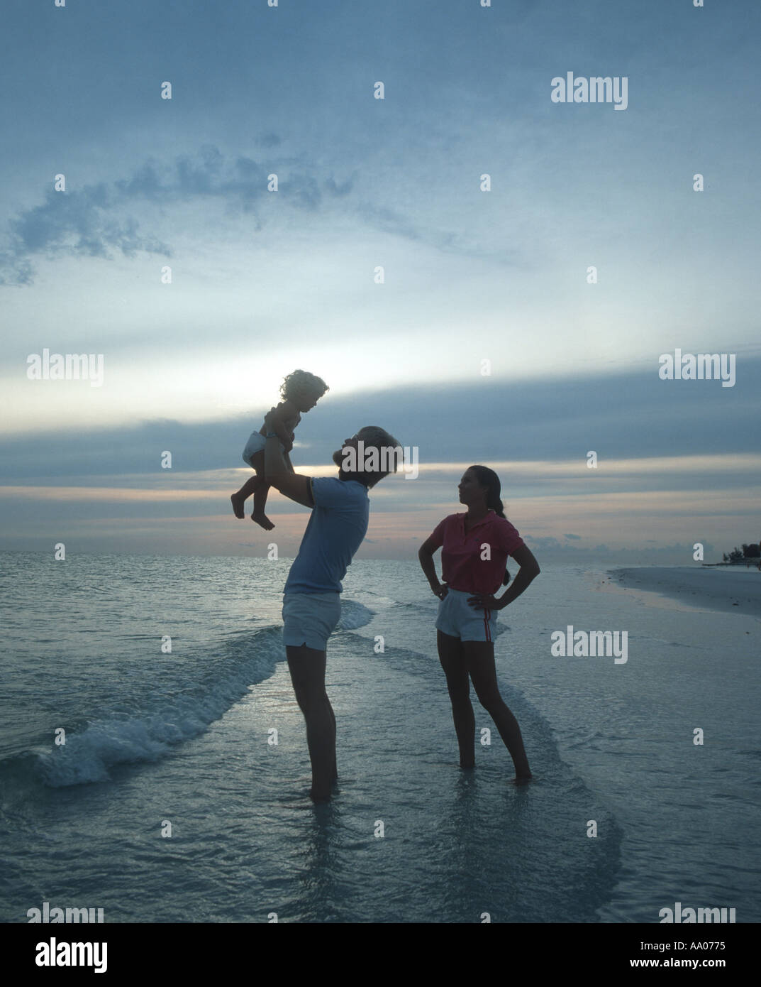 Young Couple With Baby Daughter At Beach At Sunset Stock Photo Alamy Young Couple With Baby Daughter At Beach At Sunset Stock Photo Alamy