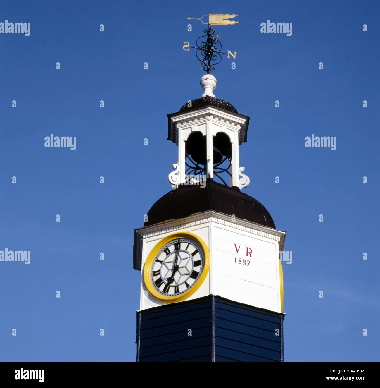 Victorian clock tower and weather vane in Coggeshall Essex England