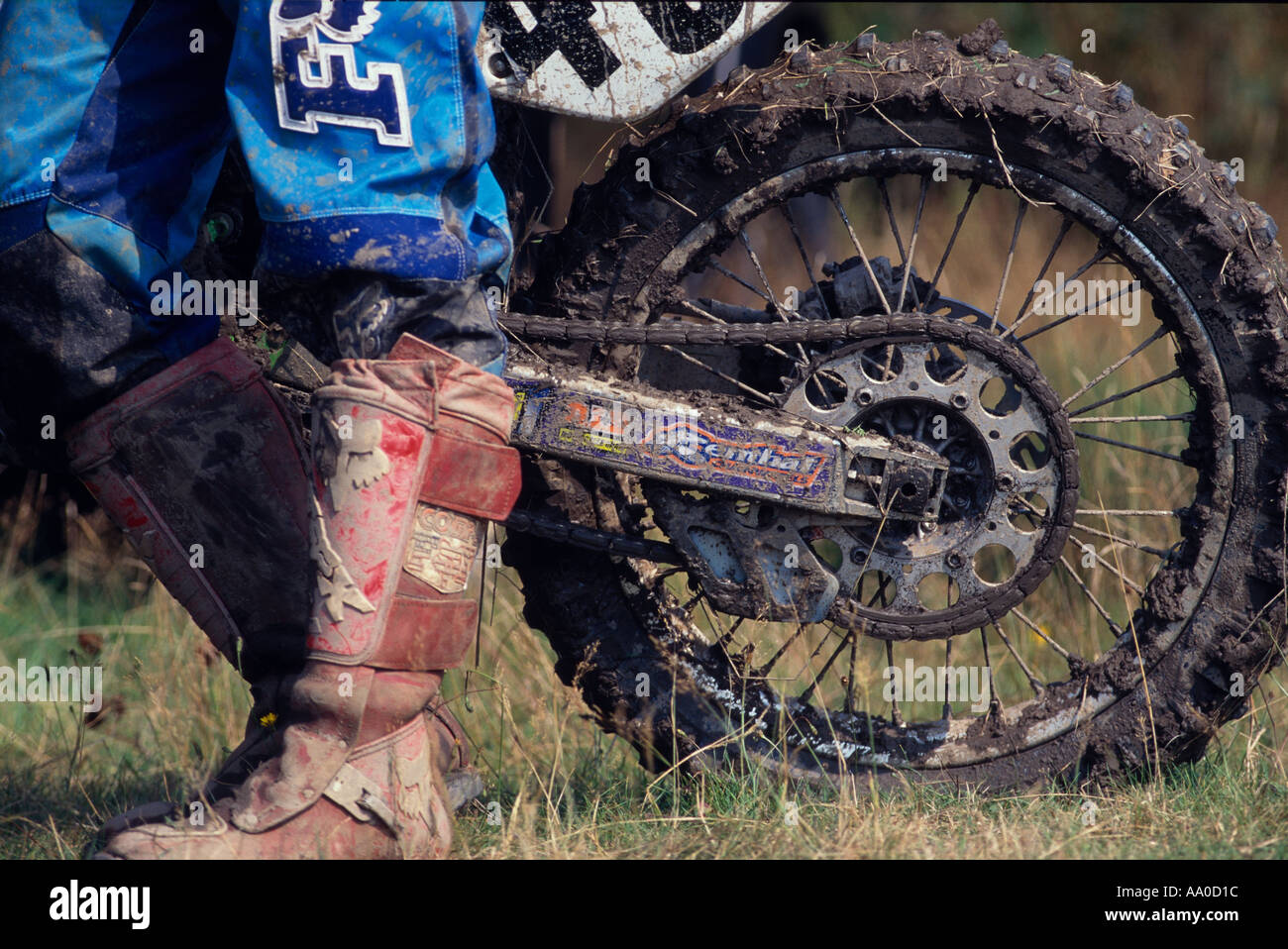 Motocross bike and boot detail Stock Photo Alamy