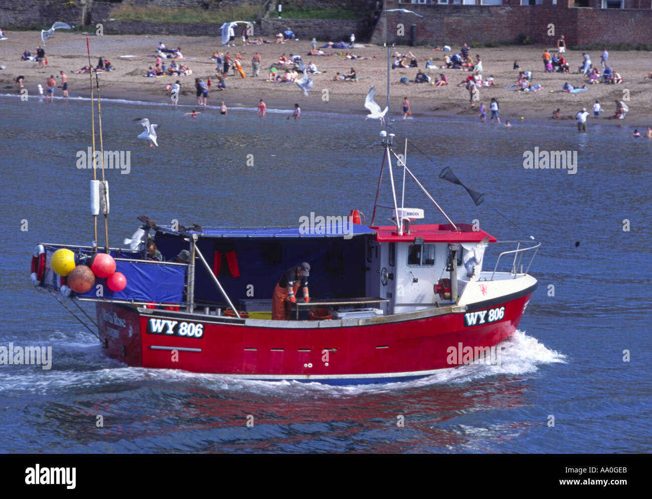 Fishing boat returning Whitby North Yorkshire Stock Photo - Alamy