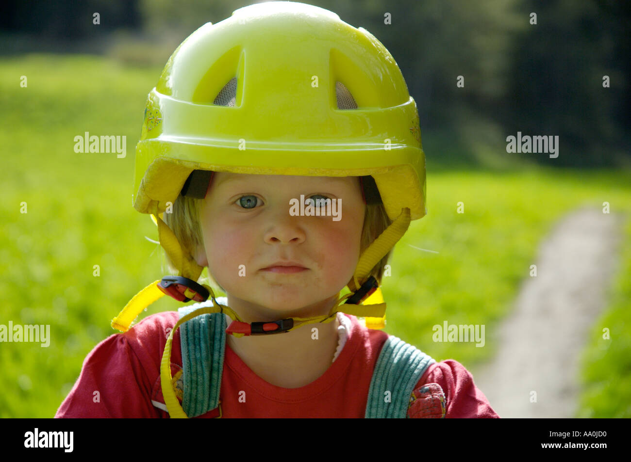 Girl in yellow helmet hi-res stock photography and images - Alamy