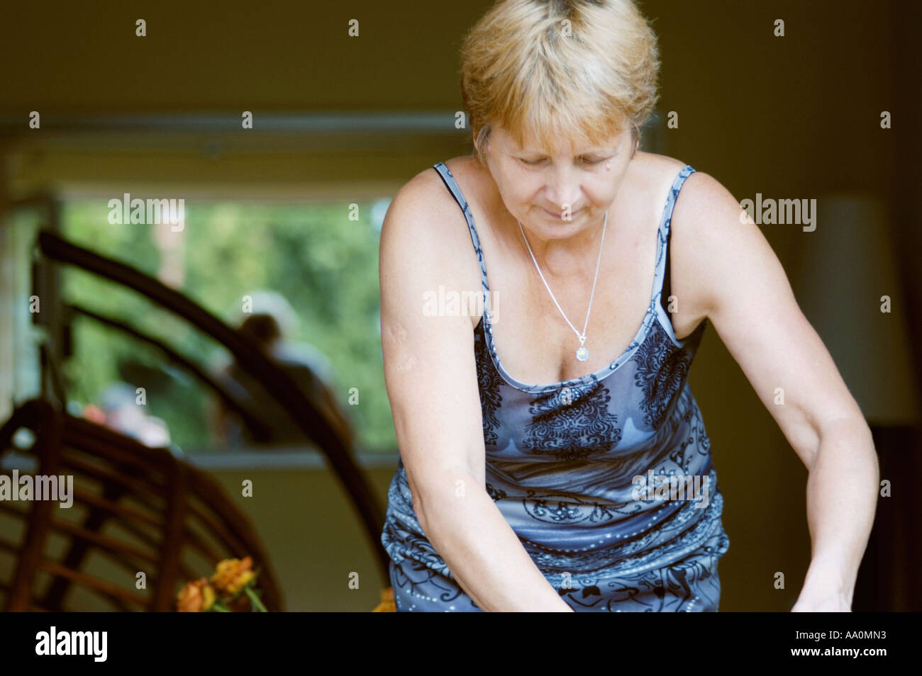 875 Older Woman Bending Over Stock Photos & High-res