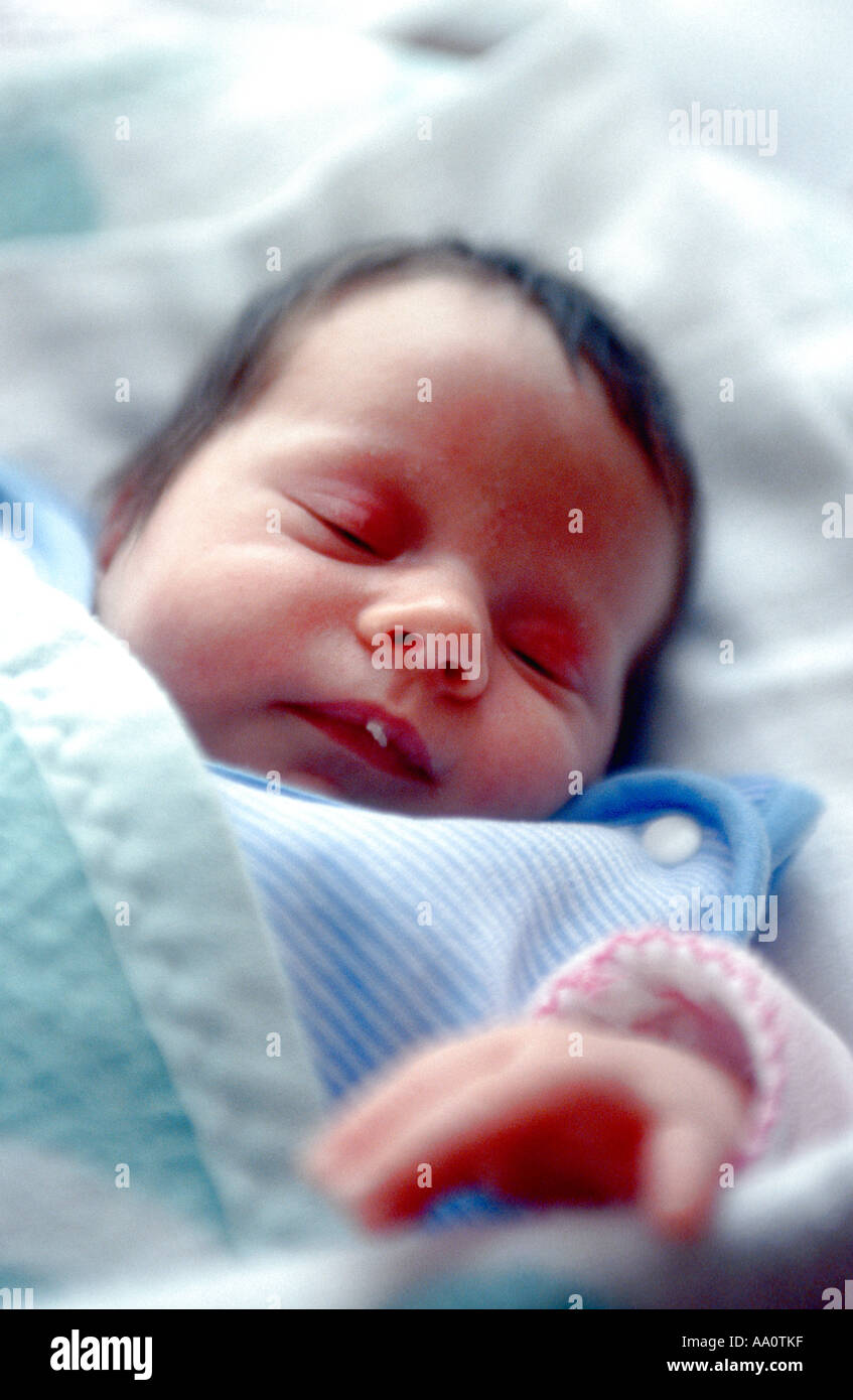 Black baby sleeping on bed hi-res stock photography and images - Alamy