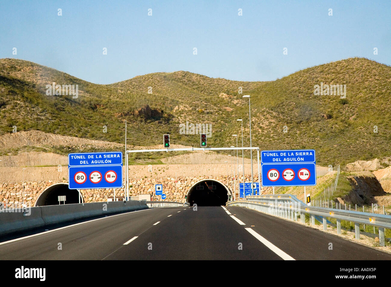 Approach to the 1250 metre long Tunnel de la Sierra Del Aguilon entrance Spanish toll road E 15 AP 7 Stock Photo
