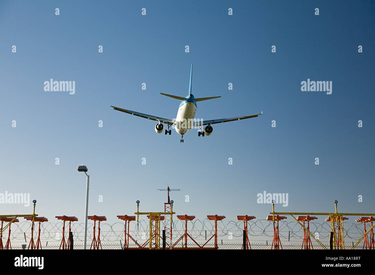 Aeroplane coming in to land Stock Photo