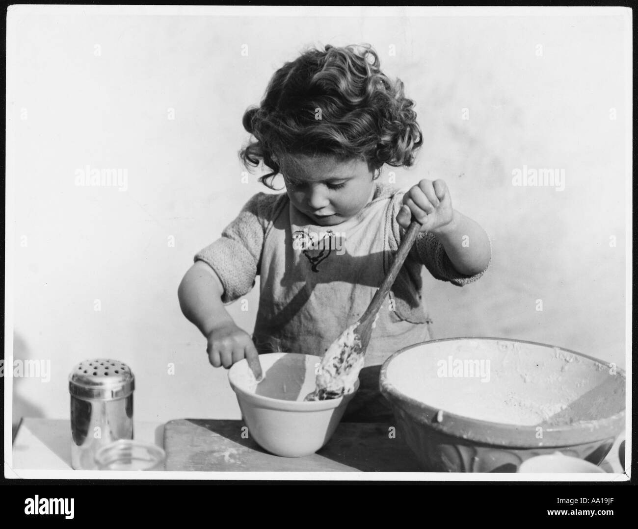 playing-with-cake-mix-stock-photo-alamy