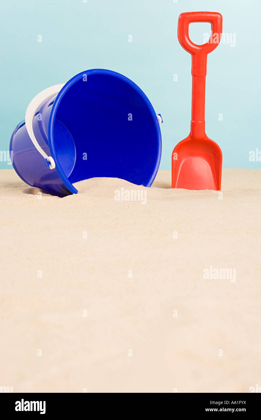 Bucket and spade on beach Stock Photo Alamy
