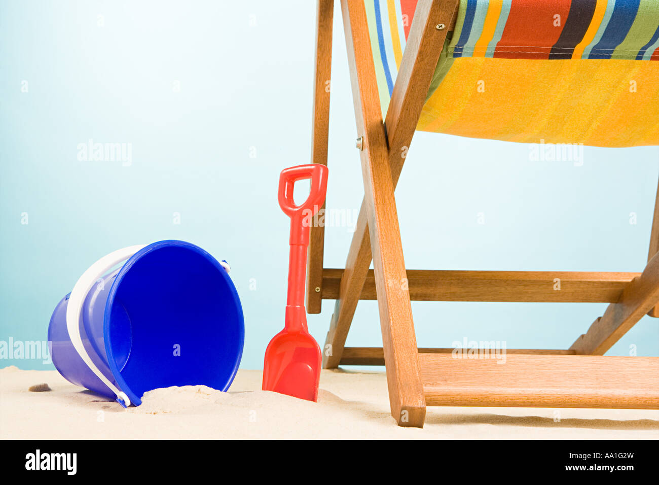 Bucket and spade and deckchair Stock Photo Alamy