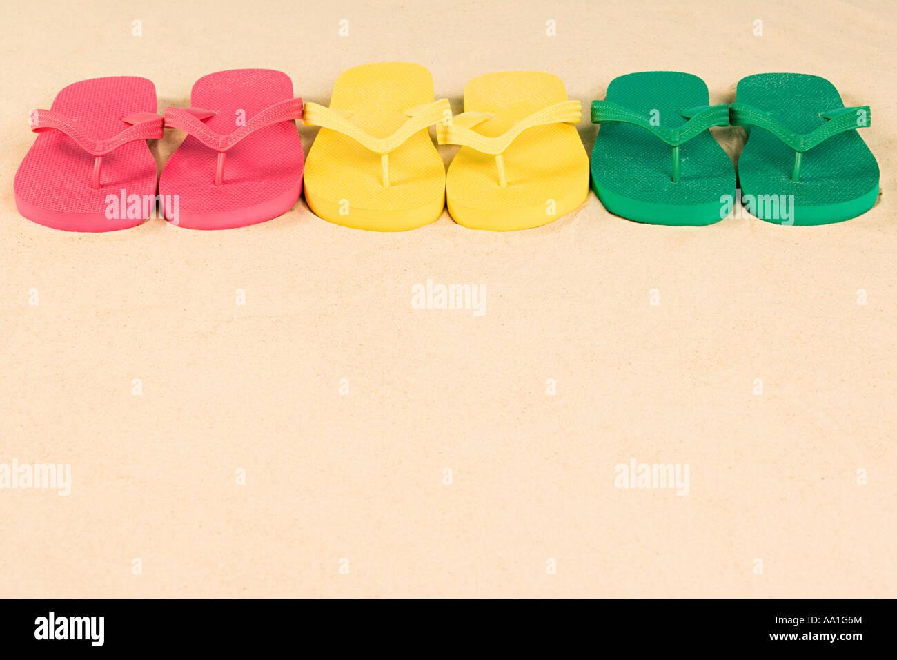 Flip flops in a row Stock Photo - Alamy