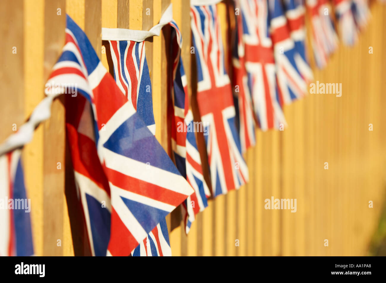 Union Jack Flags Bunting on Fence Stock Photo Alamy